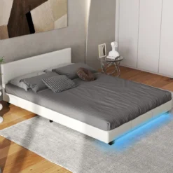 Bett mit LED Beleuchtung 140 x 200 cm Polsterbett mit Lattenrost Bettgestell Bettrahmen Weiß
