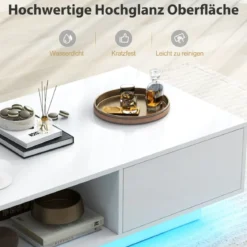 Couchtisch mit 20 Farben LED-Lichtern und Fernbedienung 95 x 55 x 31 cm Weiß/Schwarz
