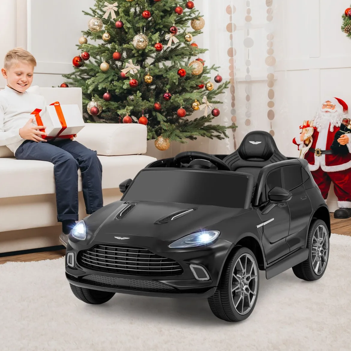 Elektrisches Kinderauto Aston Martin lizenzierter Elektrofahrzeug mit Hupe Musik & LED-Lichtern Schwarz