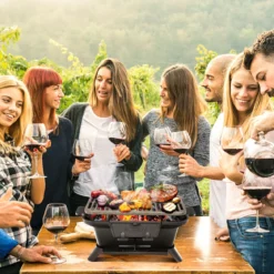 Holzkohlegrill tragbarer gusseiserner Barbecue-Grill BBQ Minigrill Tischgrill für Picknick 2-stufige Grillhöhe 40x27x18cm Schwarz