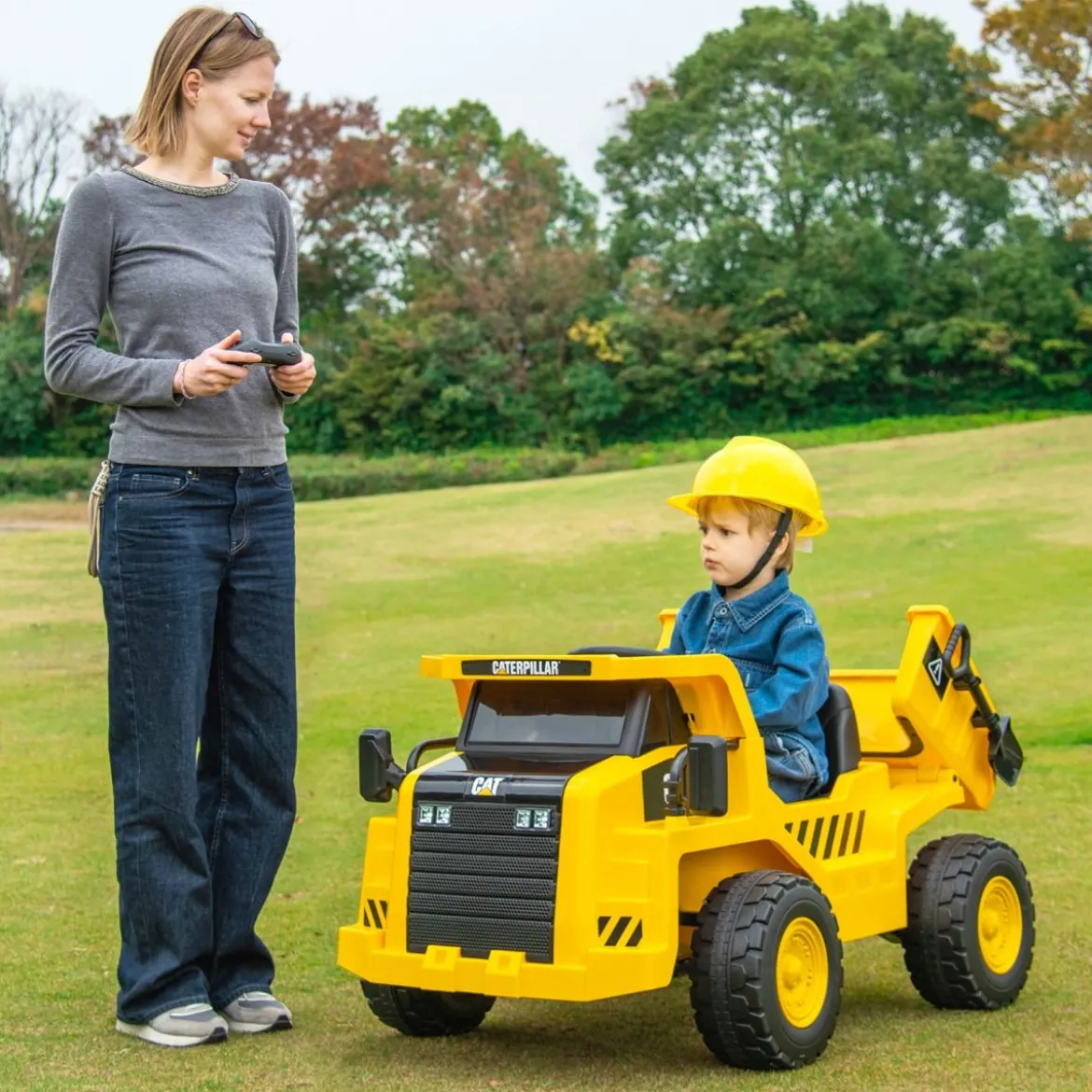 Kinder Caterpillar Elektroauto 12V Muldenkipper zum Draufsitzen mit Sandschaufel & Kippbett & Megafon