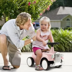 Rutschauto Rutscherfahrzeug mit Stauraum & Kippschutz Kinderfahrzeug mit Lenkrad 58 x 27 x 34 cm Rosa