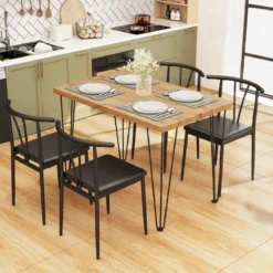 5-teiliges Esszimmertisch-Set rechteckiger Industrietisch & 4 armlose Stühle mit gepolstertem Sitz Schwarz