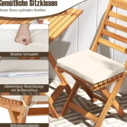 3tlg. Balkonmöbel Set Bistrotisch mit 2 Stühlen klappbares Balkonset aus Akazienholz mit 2 Kissen Cremeweiß (Horizontal)